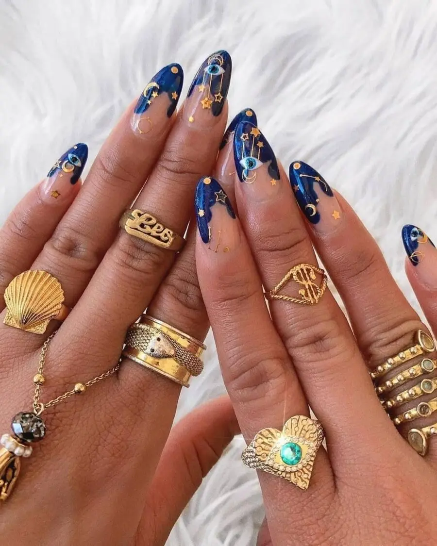 Celestial-themed zodiac nail art design