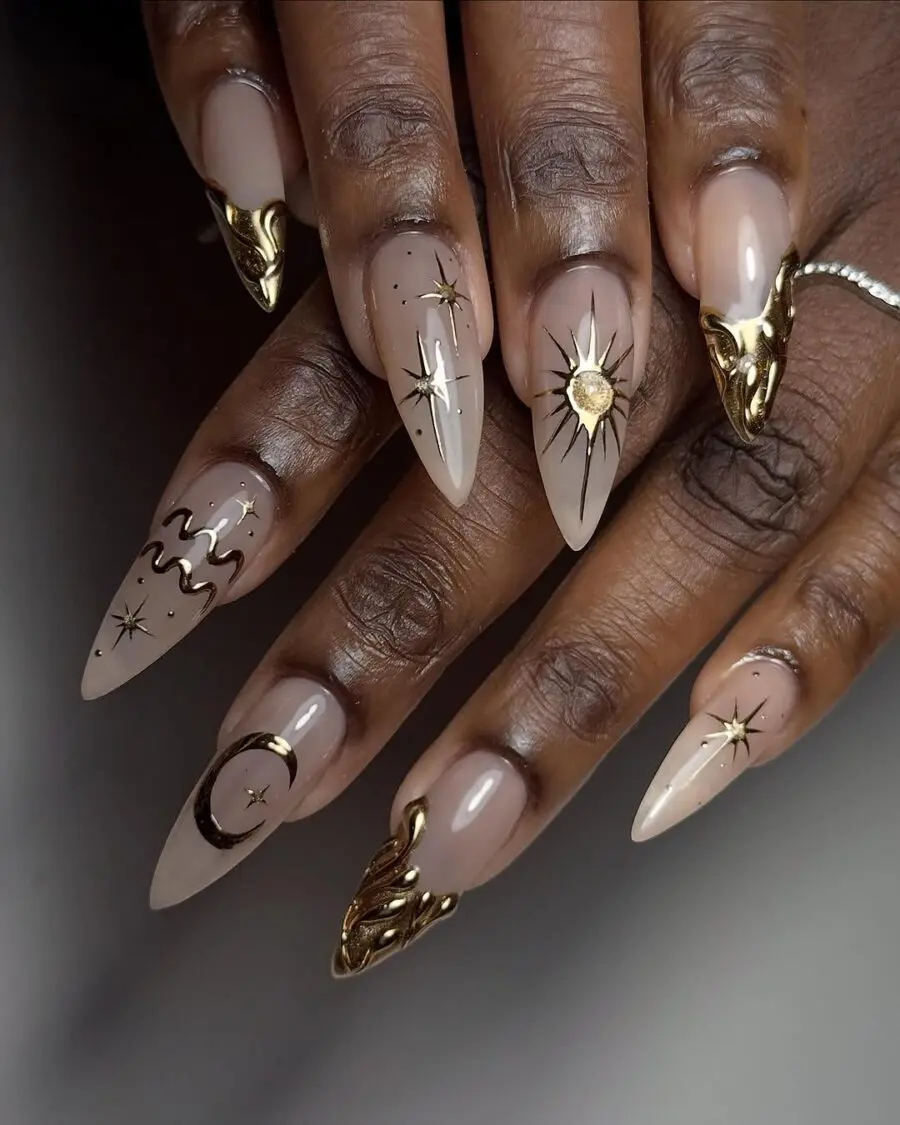 Elegant Zodiac-Inspired Nail Art with Gold Accents