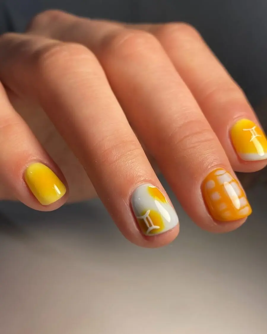 Bright Yellow Zodiac-Inspired Nail Art Design