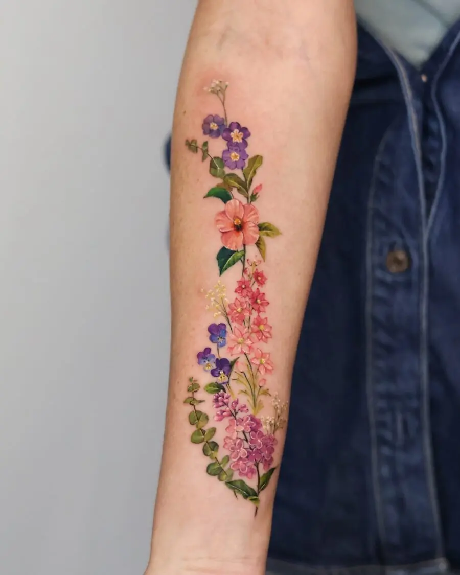 Vibrant floral tattoo with colorful blossoms