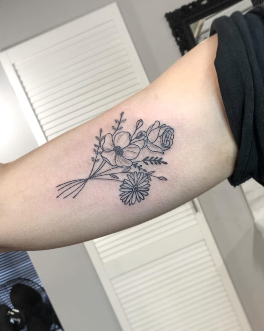 Elegant floral design for bicep tattoos