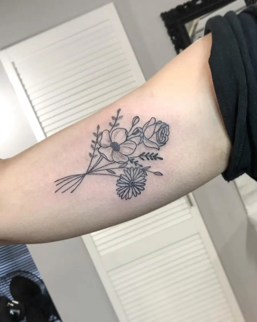Elegant floral design for bicep tattoos