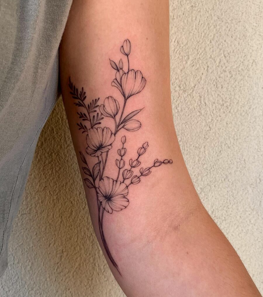 Elegant floral design for bicep tattoos