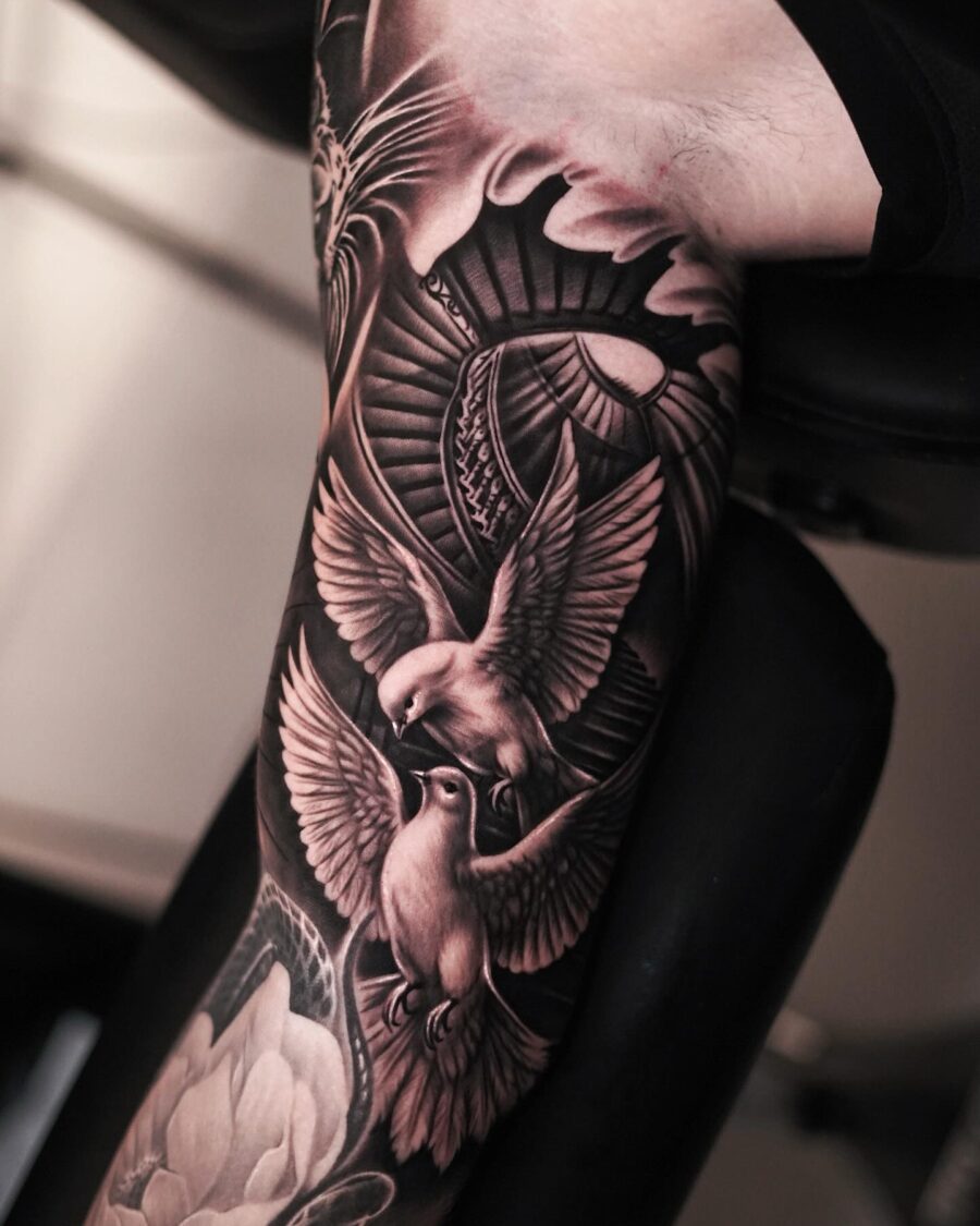 Elegant black and gray bird tattoo design