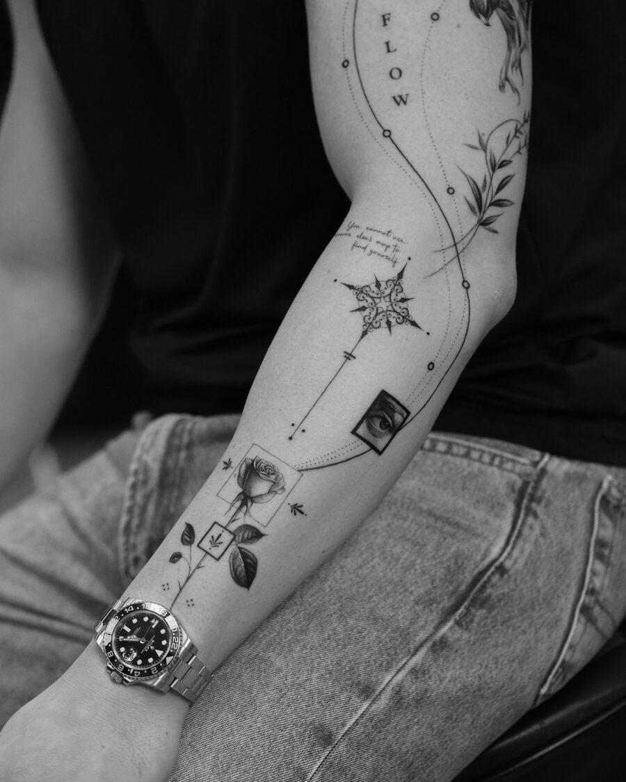 Elegant black and white biceps tattoo design