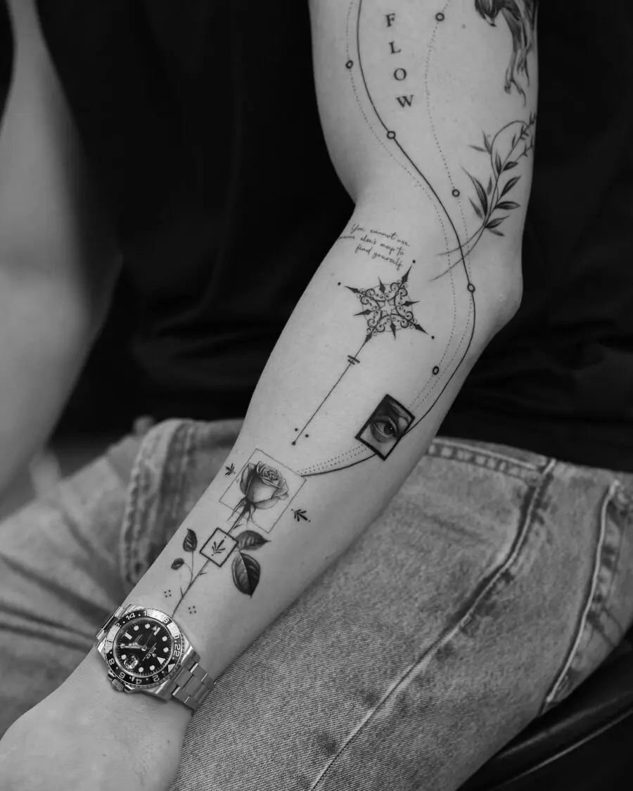 Elegant black and white biceps tattoo design