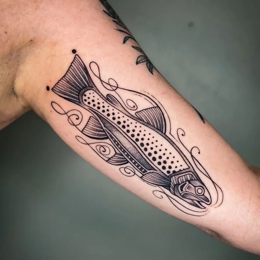 Stylish fish tattoo enhancing arm aesthetics