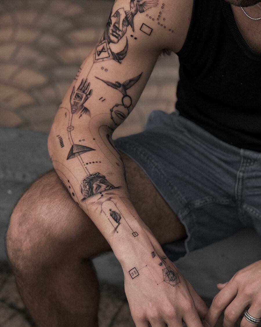 Intricate biceps tattoos showcasing unique artistry