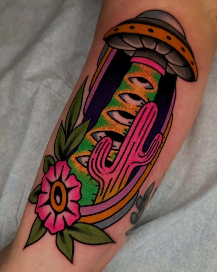 Vibrant UFO Tattoo with Floral Elements