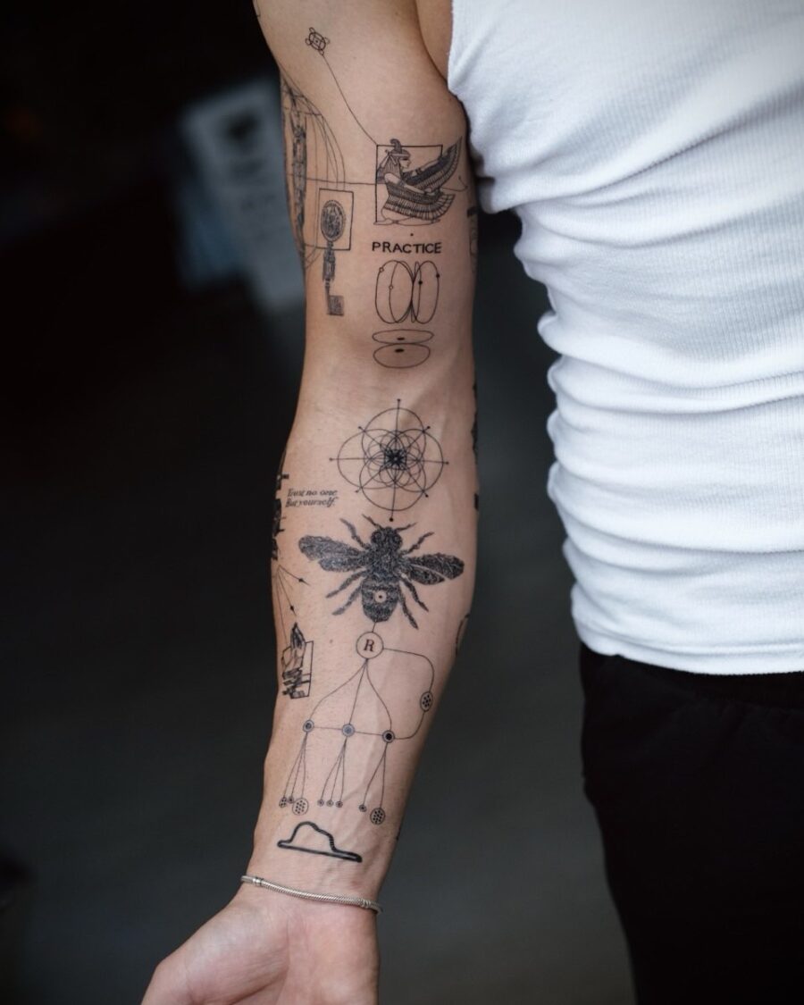 Unique bicep tattoo with geometric and bee art