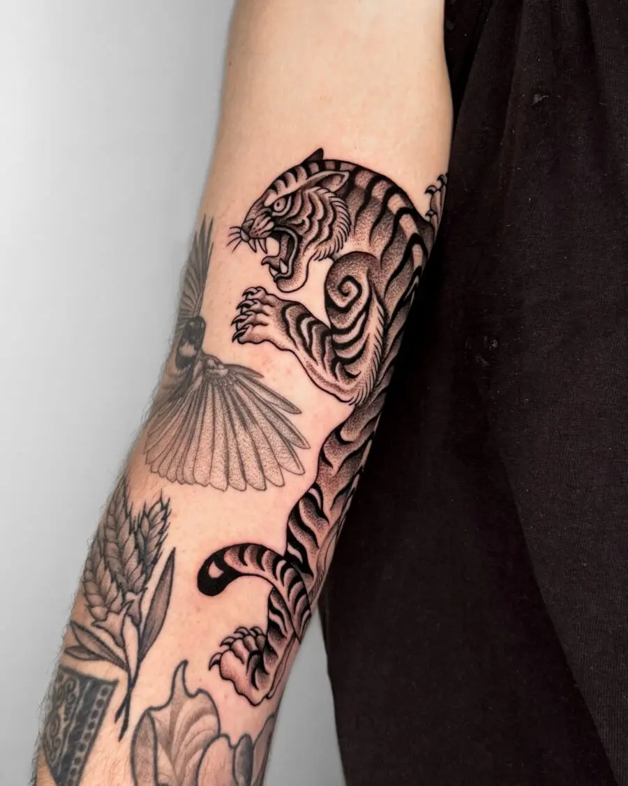 Bold tiger tattoo showcasing sleek detailing