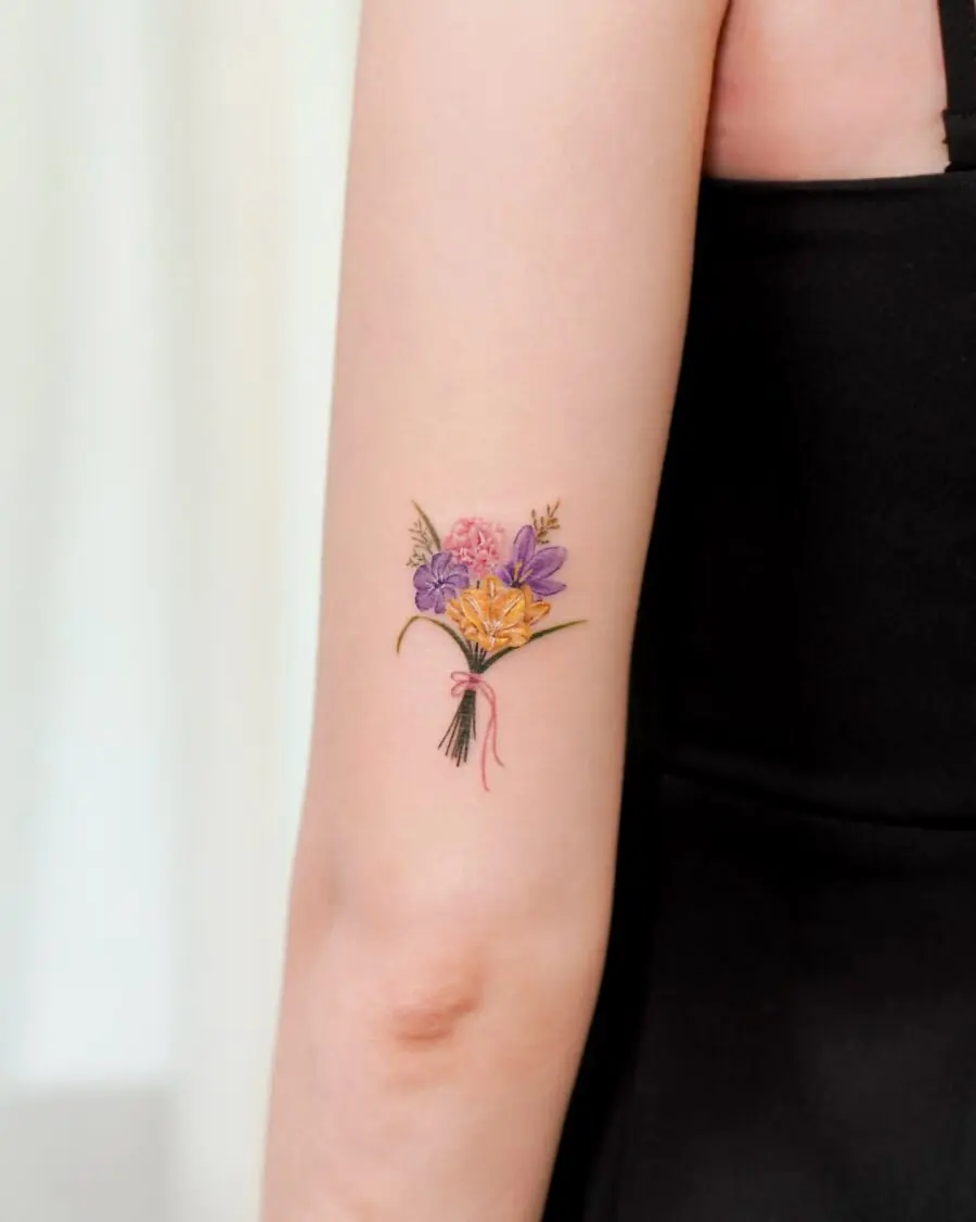 Vibrant bouquet birth flower tattoo design