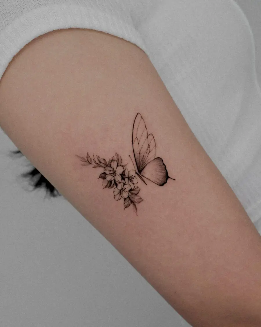 Elegant butterfly and flower tattoo design