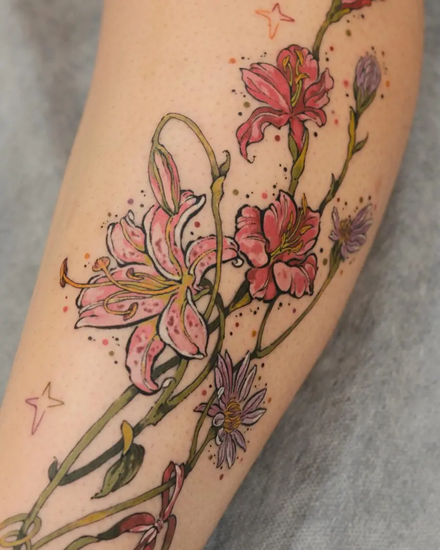 Vibrant lily tattoo with delicate floral details