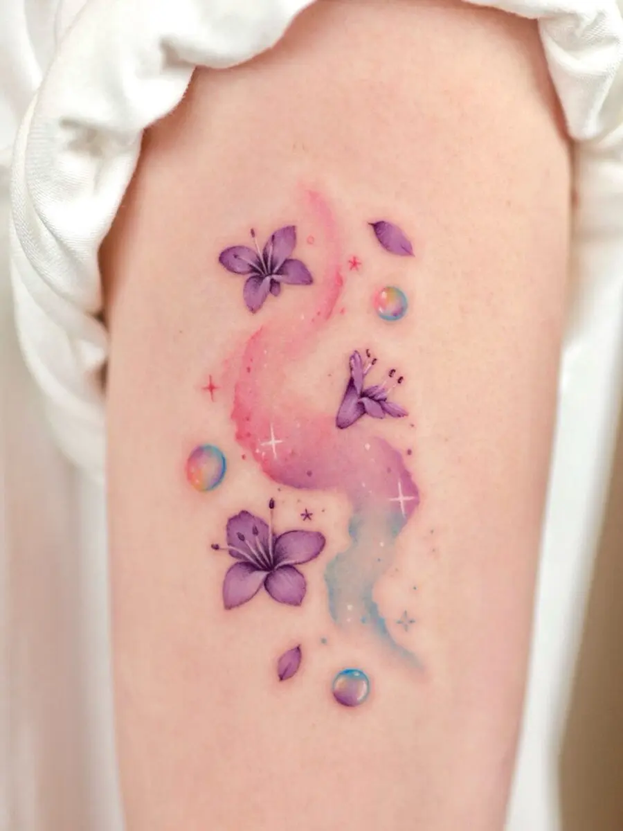 Whimsical Purple and Pink Flower Tattoo Design