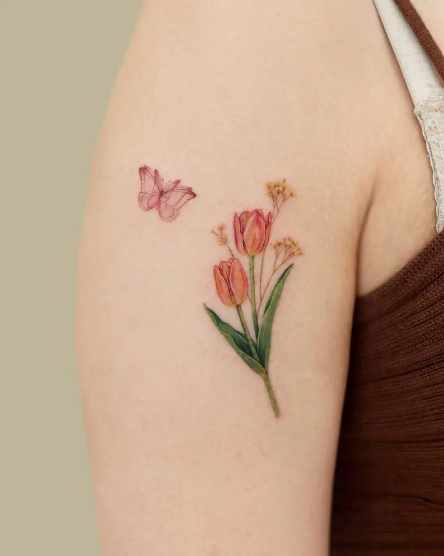 Delicate tulip tattoo with a butterfly accent