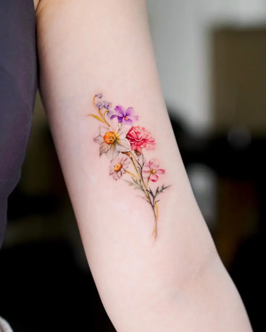 Elegant floral tattoo symbolizing birth months