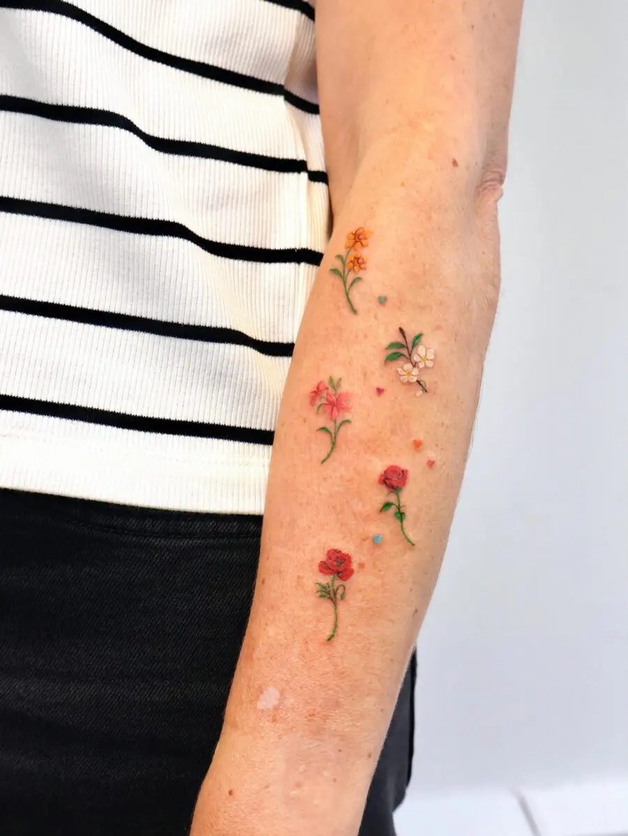 Colorful floral birth flower tattoo designs