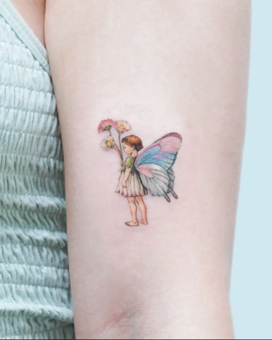 Whimsical fairy tattoo celebrating birthdays joyfully