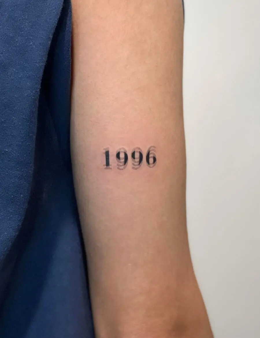 Stylish year tattoo for personal significance