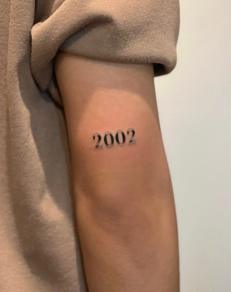 Stylish Minimalist Birthday Tattoo Idea