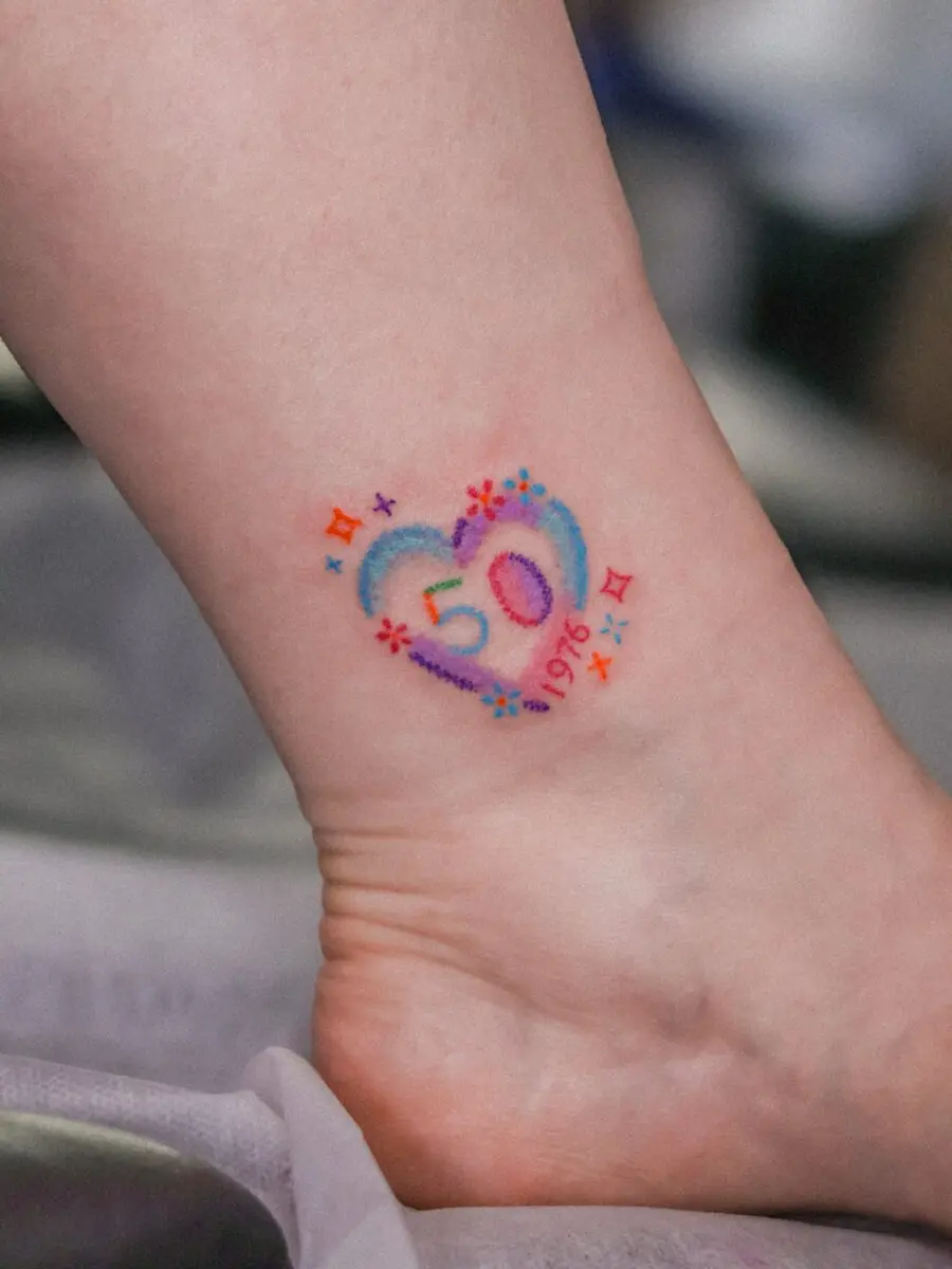 Colorful Heart Tattoo Celebrating a Milestone