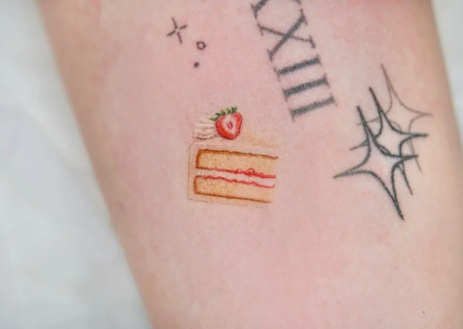 Celebrate with a sweet cake tattoo design