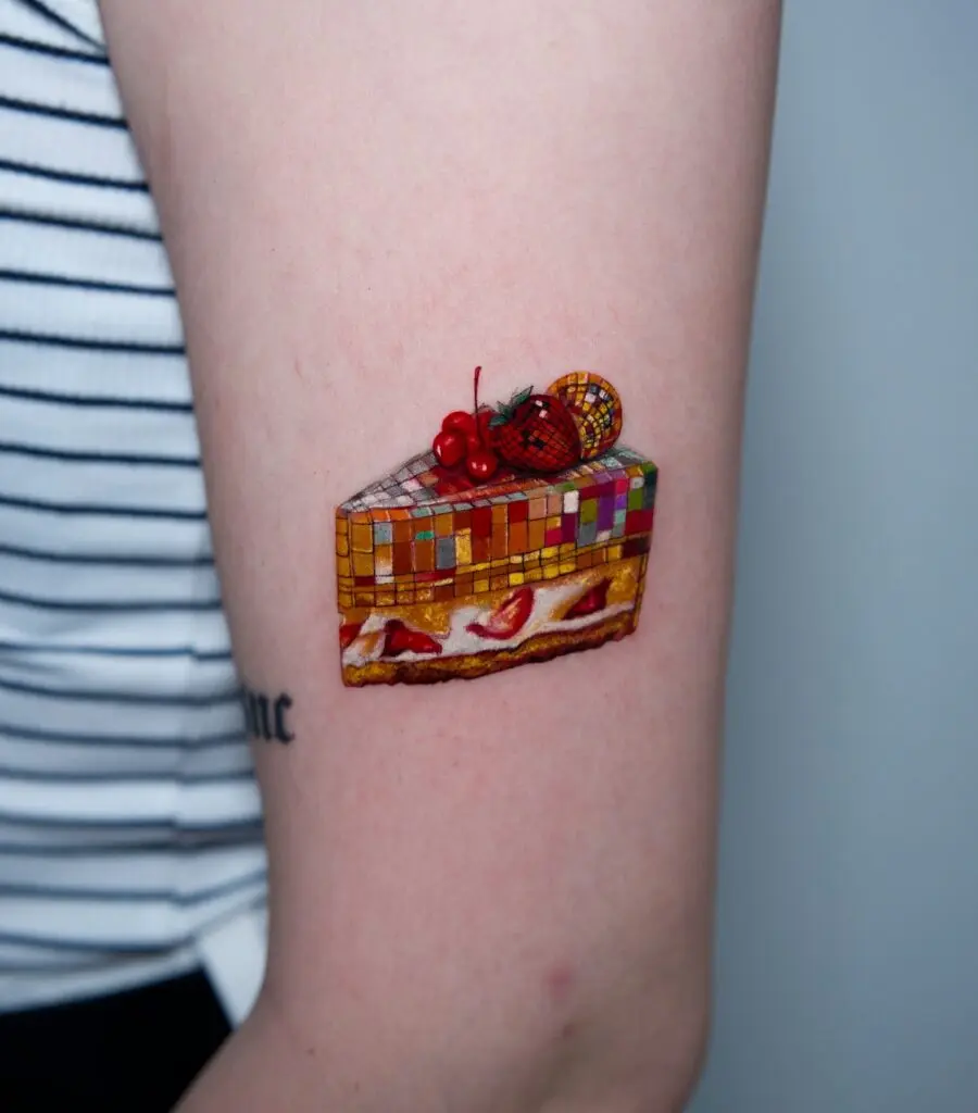 Colorful cake slice birthday tattoo design