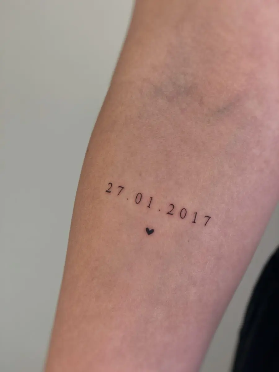 Minimalist birthday date with heart detail
