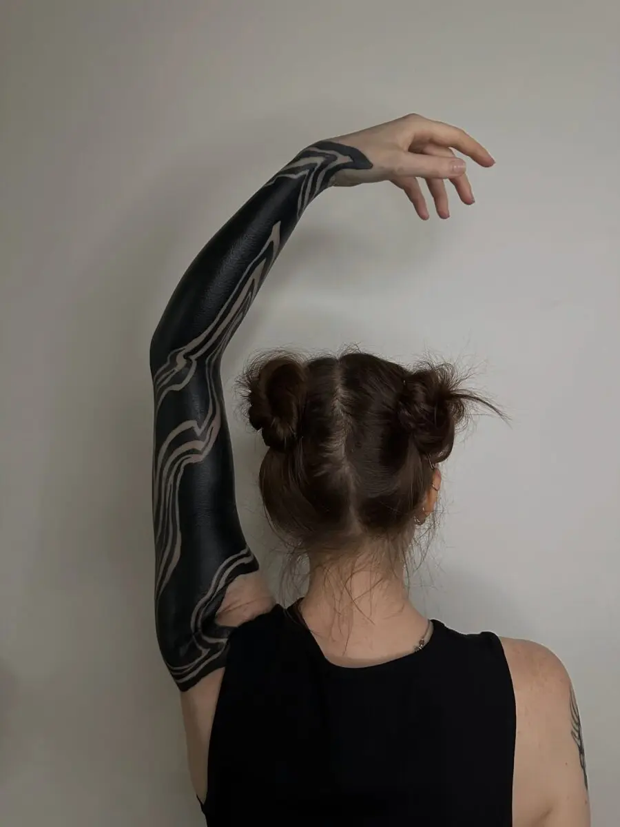 Stunning black sleeve with abstract patterns