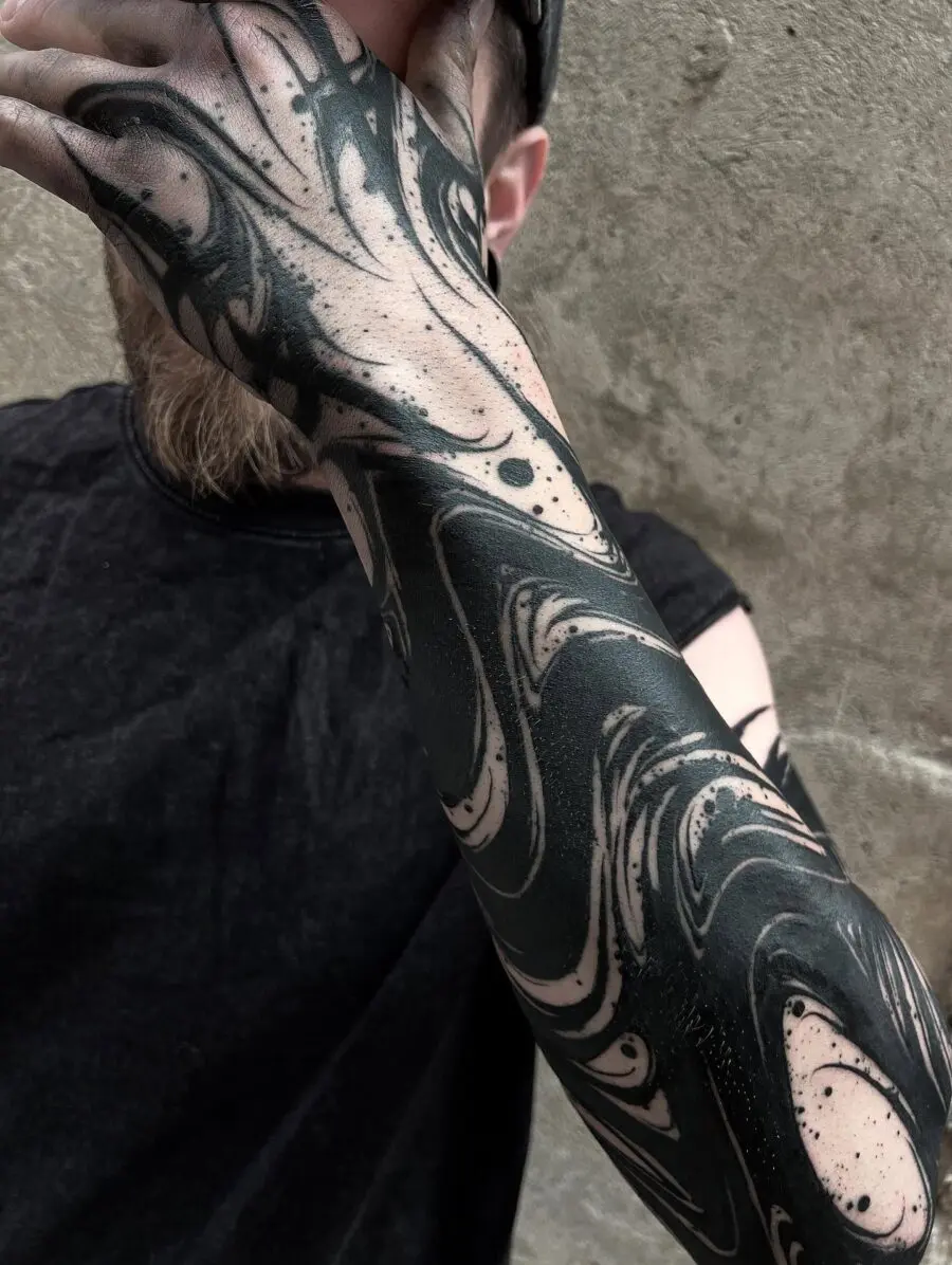 Bold marbled black and skin tone abstract design
