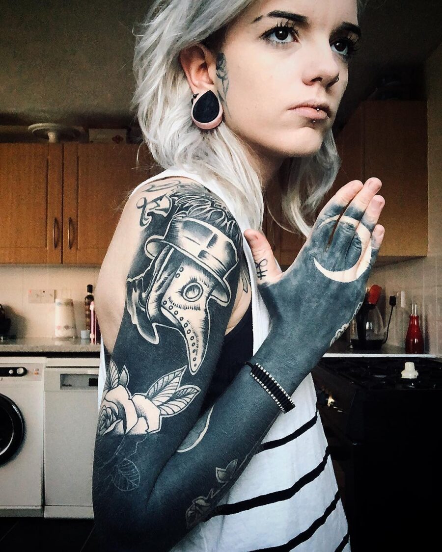 Stunning black sleeve tattoos with unique details