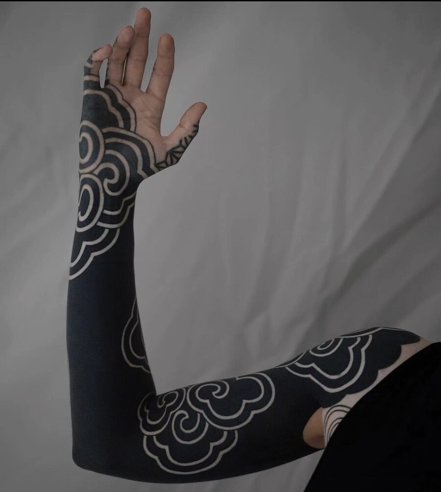 Elegant black cloud sleeve tattoo design