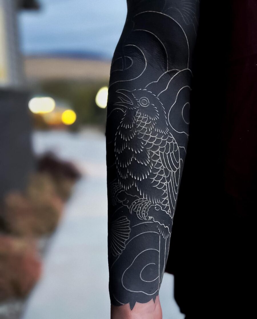 Stunning black sleeve tattoo with intricate design