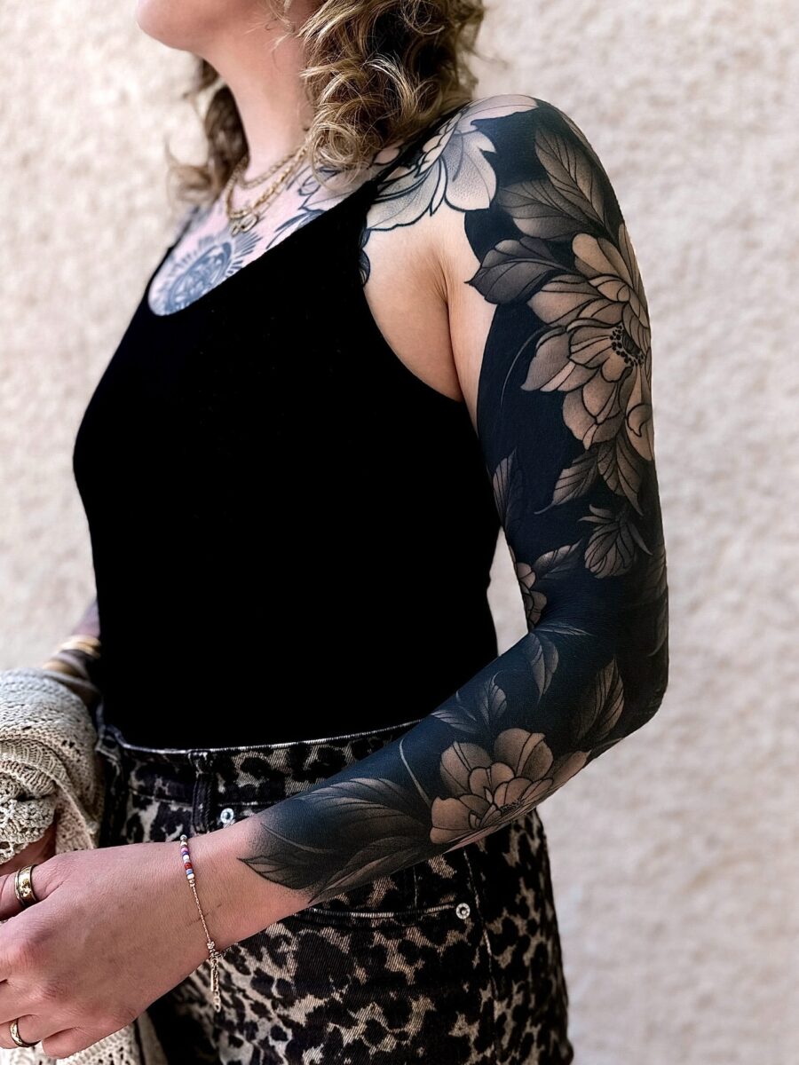 Elegant Floral Black Sleeve Tattoo Design