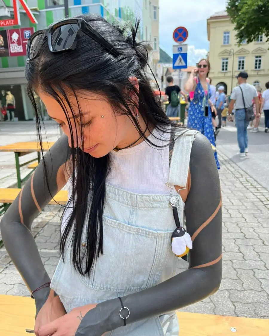 Elegant Black Sleeve Tattoo with Fashionable Vibes