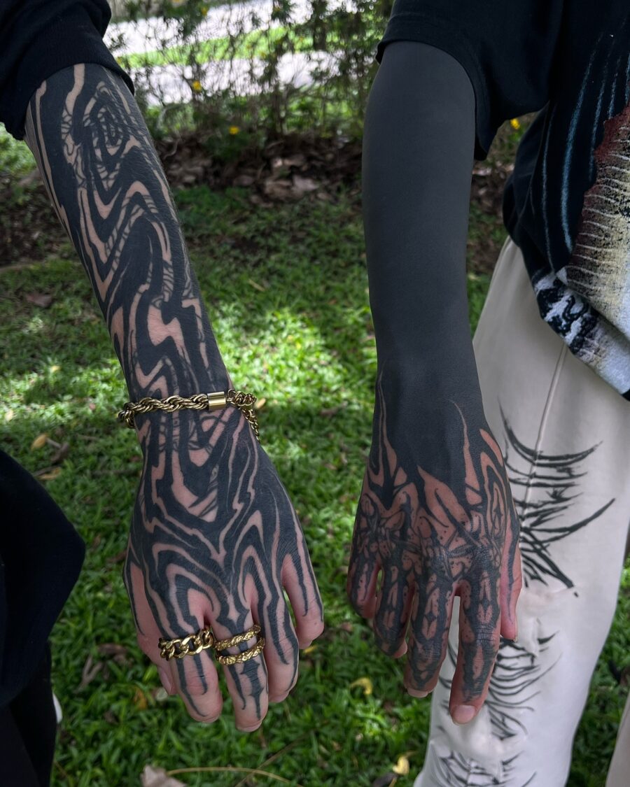 Intricate black sleeve tattoo designs showcased boldly