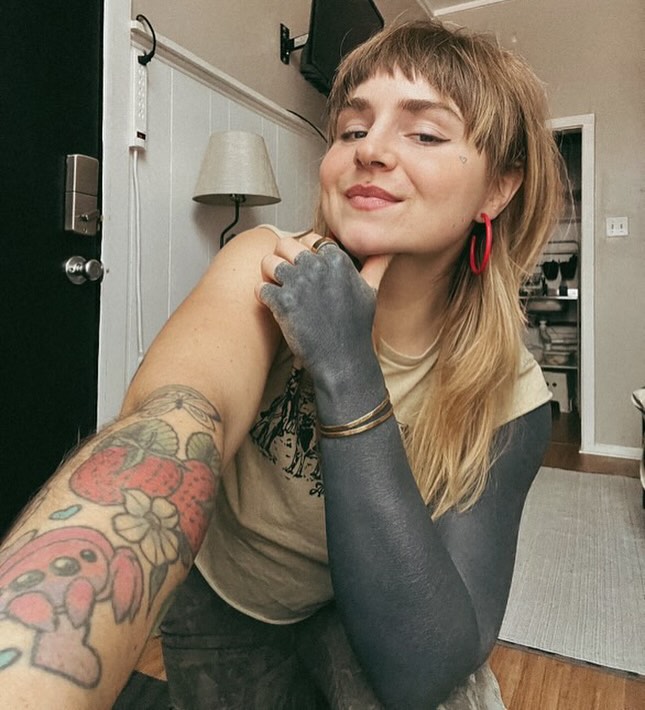 Quirky Black Sleeve Tattoo Style in Cozy Setting
