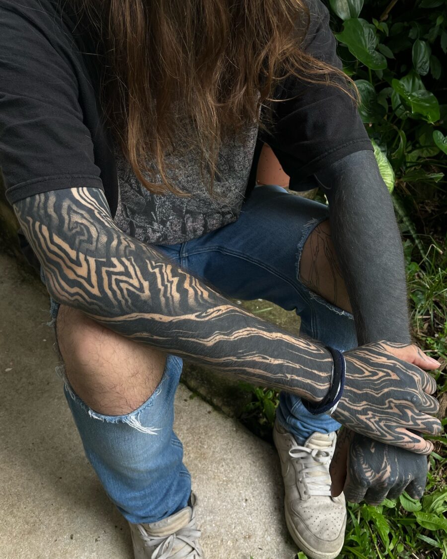Striking black sleeve tattoo patterns showcased here
