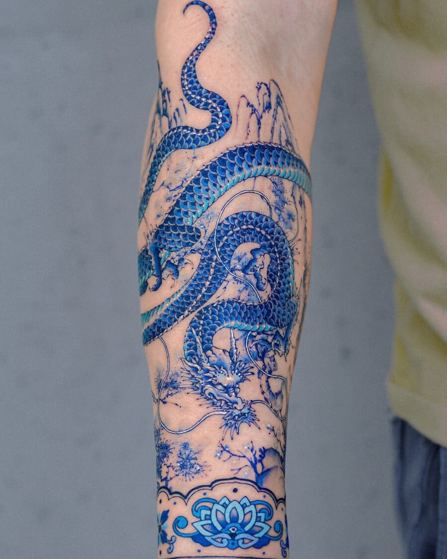 Stunning blue dragon half sleeve tattoo detail