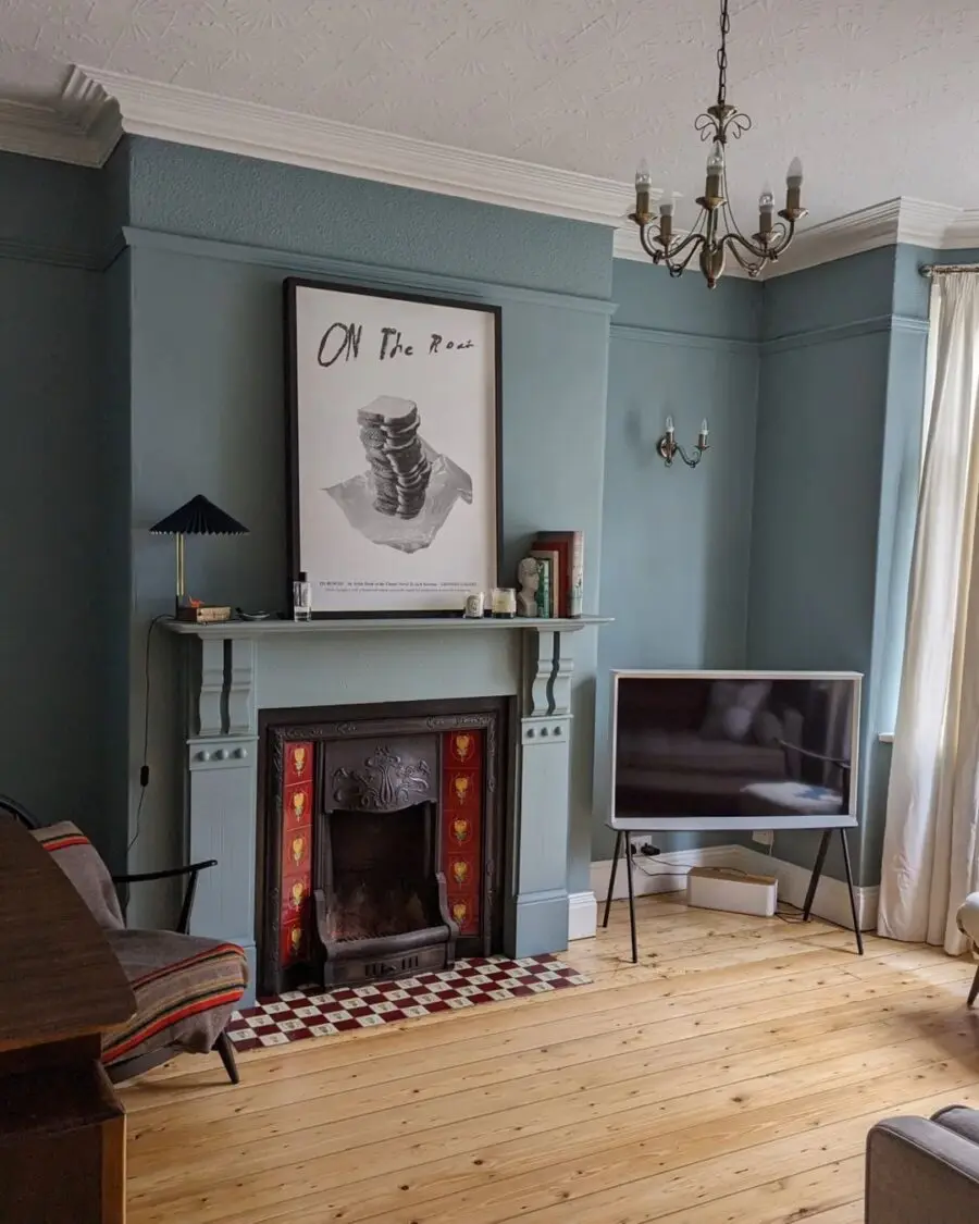 Charming blue living room with artistic accents