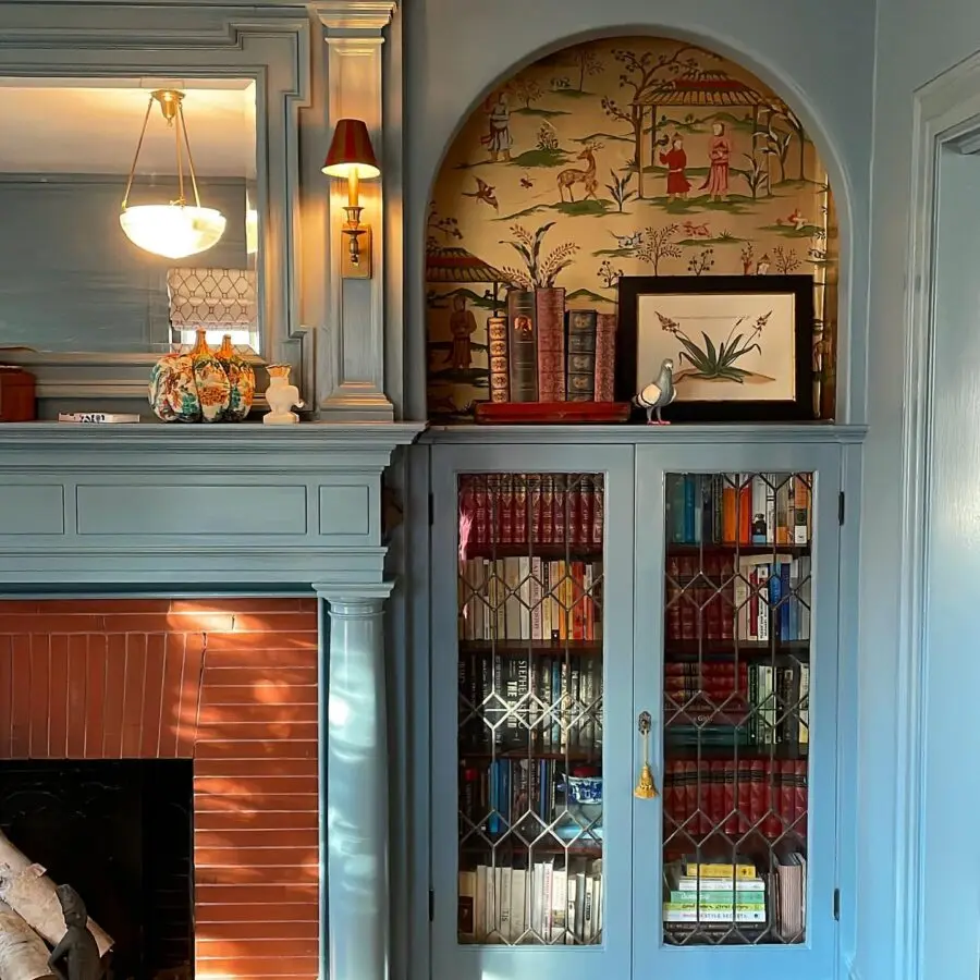 Charming blue bookshelf with vintage accents