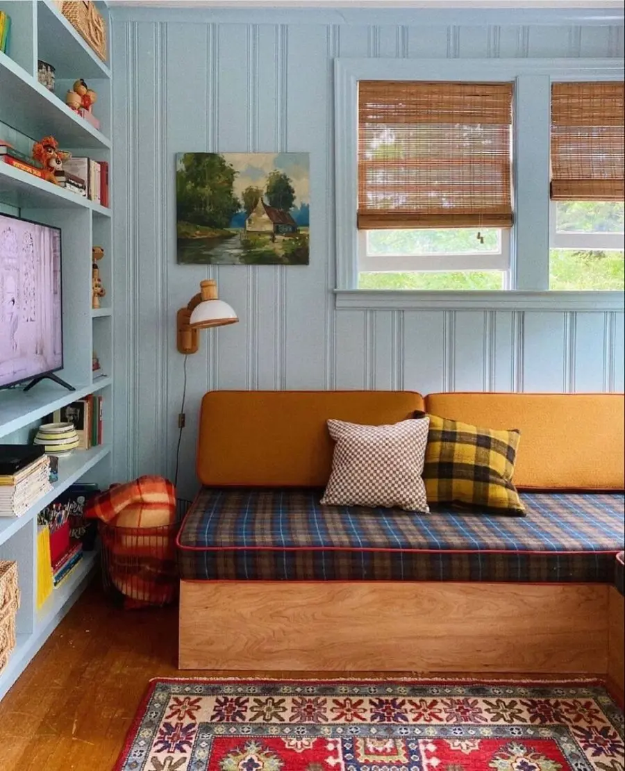 Cozy Blue Living Room with Warm Accents
