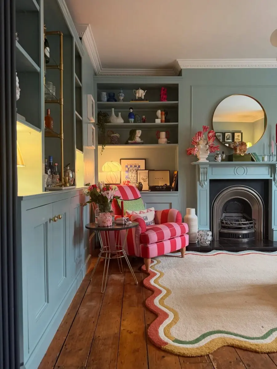 Charming Blue Living Room with Playful Accents