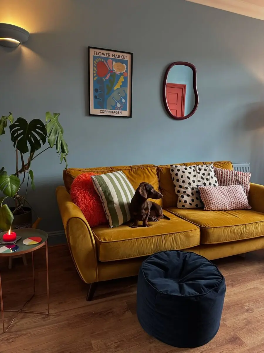 Vibrant yellow sofa with playful accessories