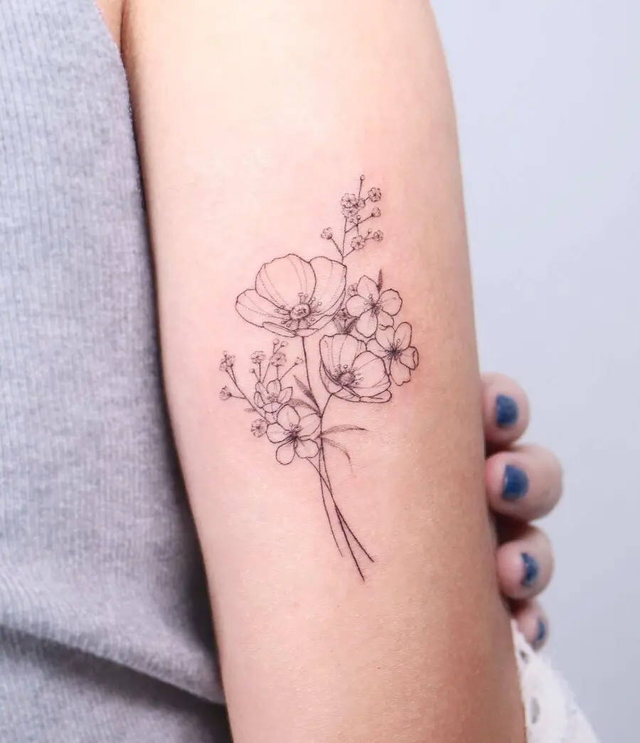 Delicate Buttercup Floral Tattoo Elegantly Embellished