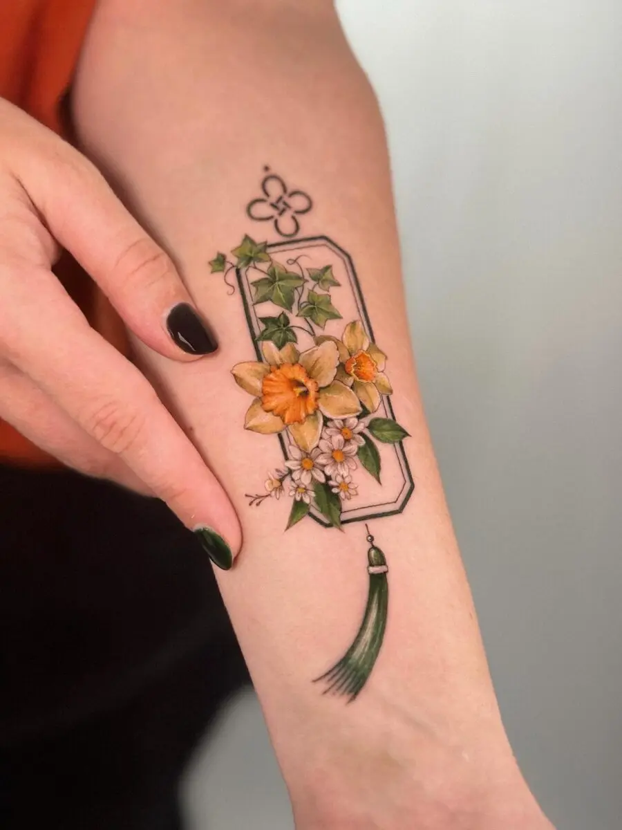 Vibrant buttercup tattoo with elegant detailing