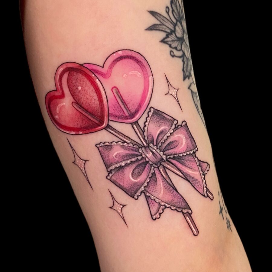 Charming candy heart lollipops tattoo design
