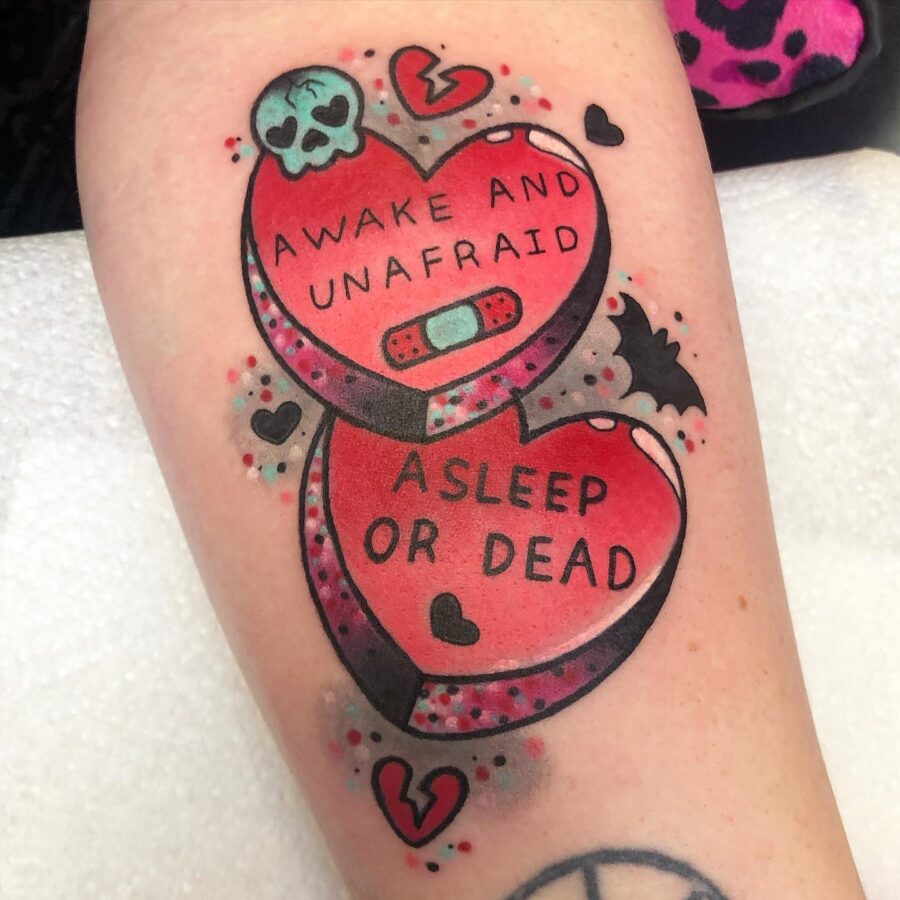 Playful yet edgy candy heart tattoo design