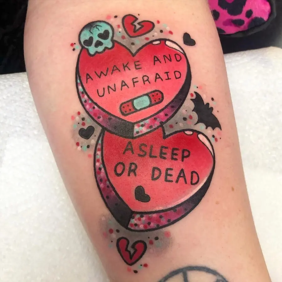 Playful yet edgy candy heart tattoo design